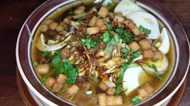 Top view of Soto Klethuk culinary typical of Blora, Central Java, Indonesia. food video.