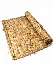 Hand-woven straw placemat, rolled up.  Natural, light beige color.  Intricate,  chevron pattern.  Edges are bound with straw