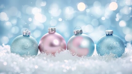 Naklejka premium Elegant Pink and Blue Christmas Ornaments Resting on Snow with Bokeh Light Background