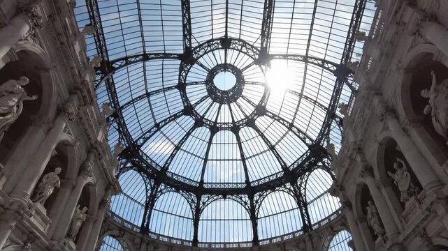 Observing Galleria Vittorio Emanuele Ii Glass Dome in Milan