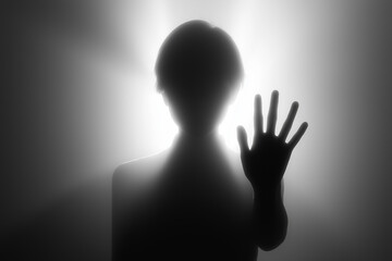 Black and white silhouette of a person with their hand reaching out, suitable for wellness, assistance, support, or guidance concepts.