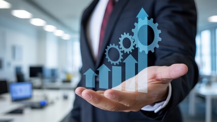 Businessman displays holographic projection illustrating process improvement and upward trend