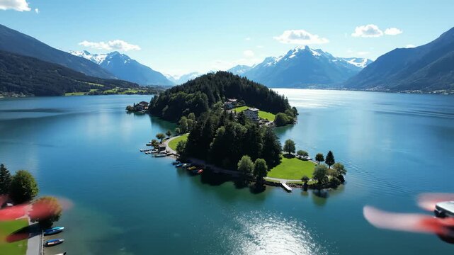 Aerial View of Achensee Lake With an Island Surrounded by Mountains in Austria