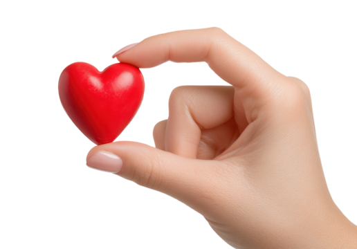 Human hand gently holding small glossy red heart symbol between fingers, isolated on transparent background
