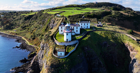 Aerial view of Blackhead Lighthouse on the beautiful and spectacular coastline of the Glens of...