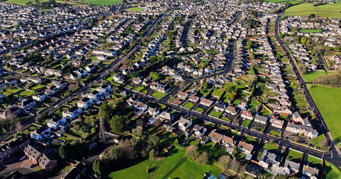  Aerial view of Housing Residential homes and Business Towns of Co Antrim Northern Ireland