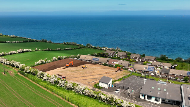 Aerial view of machinery at the construction of the sports complex Corran Integrated Primary School and Nursery Larne Co Antrim Northern Ireland 10-02-2025