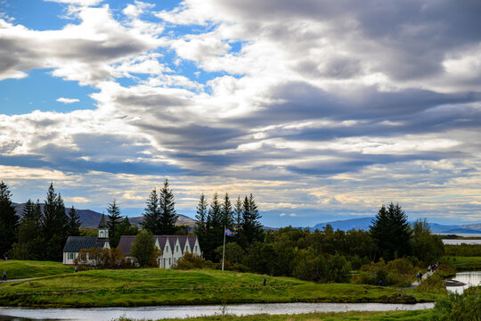 Thingvellir National Park Historic church and buildings in the green rift valley of Þingvellir Iceland - Powered by Adobe