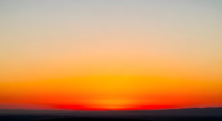 Obraz premium Warm Horizon Fiery Colors of a Sunrise Casting a Vibrant Glow Across the Sky, Inspiring Hope and Serenity