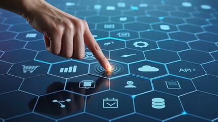 Human finger interacts with a glowing digital interface composed of interconnected hexagonal icons.
