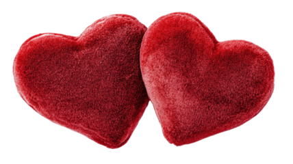 Two red velvet hearts with soft textured surface and vivid romantic shape displayed in detailed view isolated on white background