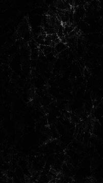 Grunge texture of the crumpled paper surface, animated black vertical background.