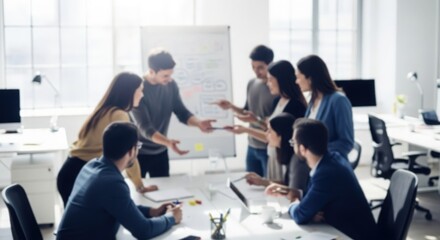 Team of professionals engaged in collaborative thinking and innovation in a bright office