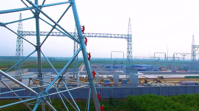 High Voltage Tower Commissioning Job 111 with Workers