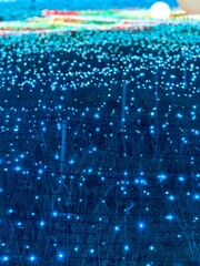 Abstract of blurred background and bokeh of blue light on the grass