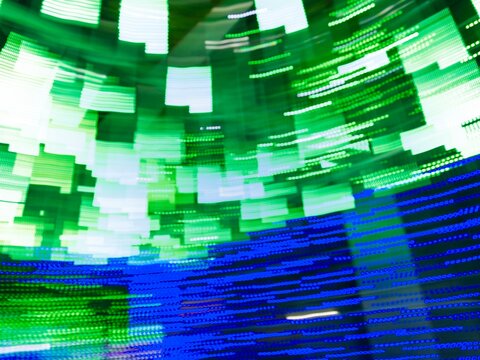 Neon light motion blur abstract background. Abstract blue and green lights trail on the dark background - Powered by Adobe