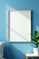 Blank picture frame on blue textured wall, with simple decor, style, design