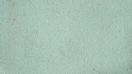 Vintage blue wall background with dirty textured paper and grunge concrete surface