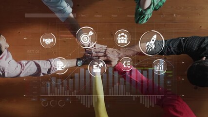 Aerial view of a collaborative business strategy meeting featuring hands gesturing over data visualization and analysis to achieve success metrics. Raster - Powered by Adobe