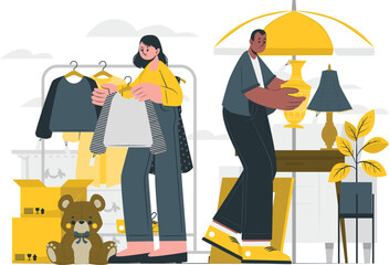 People organizing items for a garage sale