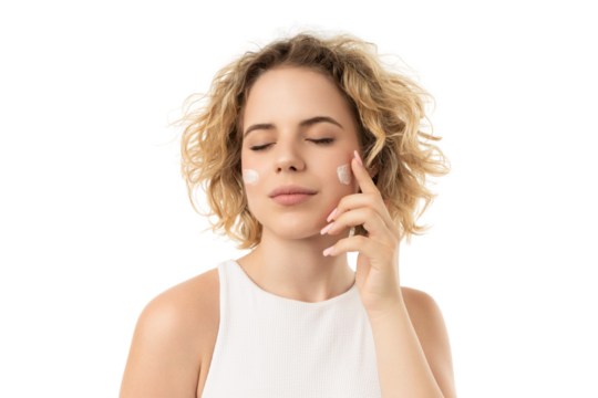 Woman applies moisturizer while relaxing, isolated on white, PNG