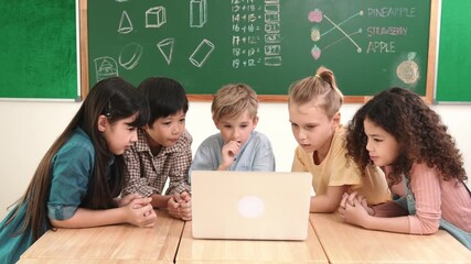 Top view diverse student looking at laptop and learning about coding engineering code and generating AI. Skilled children working together while brainstorm idea and planning creative plan. Pedagogy. - Powered by Adobe