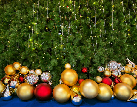 Close up christmas tree decoration of baubles in gold, silver, red, and green color. Beautiful christmas baubles decoration. Merry Christmas