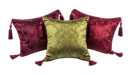 Lush pillows two red, one gold, with tassels