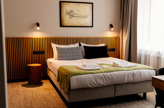 Beautiful modern room with brown acoustic wall panels. Modern hotel bathroom. Modern stylish hotel. Interior of a modern apartment.