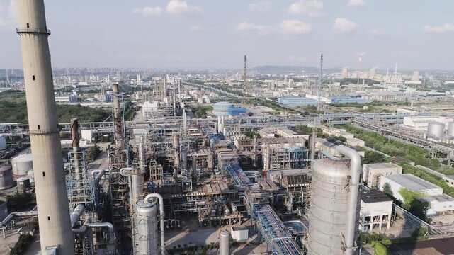 Large Industrial Refinery Factory with Storage Tanks and Equipment