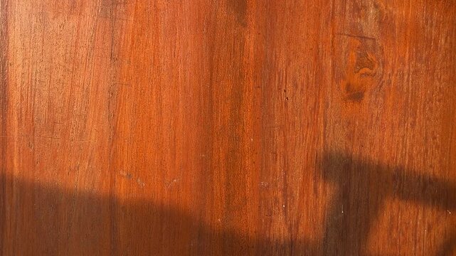 Side view of empty wooden door with shadows. Natural texture in harmonious wood. brown wood plank door background texture. Isolated, flat lay, copy space, empty, free, negative, text. 