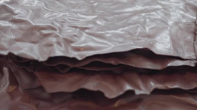 Close Up Shot Of Leather Animal Hides Stacked In A Textiles Manufacturing Factory.
