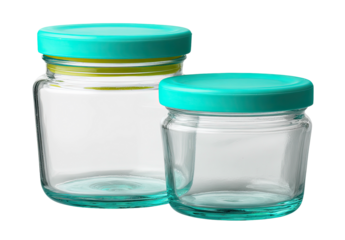 Two clear glass jars with teal lids on black background