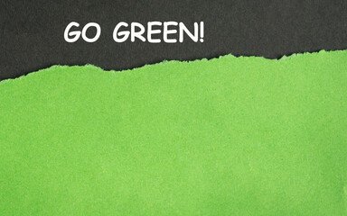Go Green Message on Torn Paper