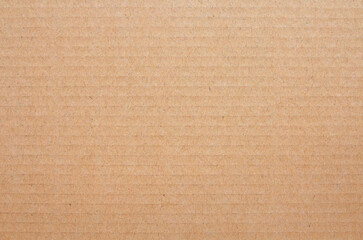 Cardboard sheet texture background, detail of recycle brown paper box pattern.