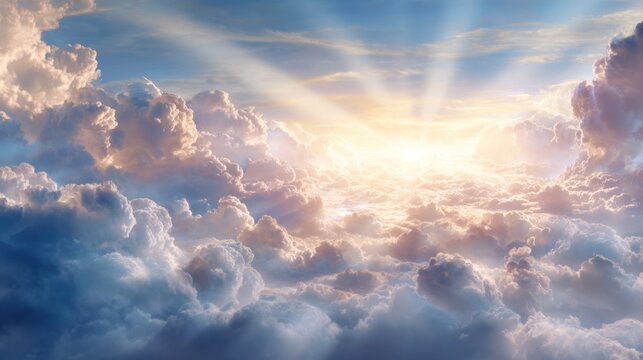 Soft clouds stretch across the brightening sky as golden rays of sunlight break through at sunrise creating a peaceful and serene atmosphere in the early morning.