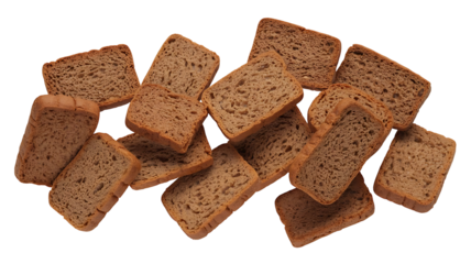 Pile of small rectangular pieces of dark rye crispbread or zwieback scattered on a transparent background isolated on transparent background