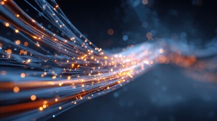 Bright strands of light intertwine in a dark setting giving an impression of movement and energy.