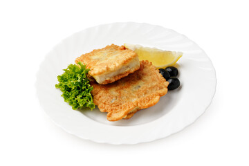 Delicious crispy fish fillets served with lettuce and lemon slice