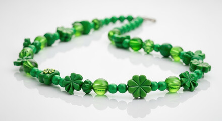 Exquisite St Patrick's Day necklace featuring green shamrocks and beads, perfect for celebrating St Patrick's Day. Elegant necklace captures spirit of holiday, offering festive design.