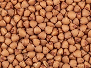 Close-up of buckwheat grains, showing their triangular shape and brown color.