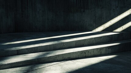 Dark and moody concrete room with sunlight streaming in.