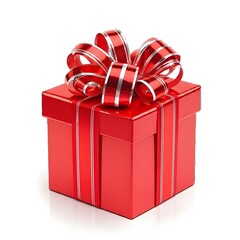 Obraz premium A red gift box with a large striped bow on top, set against a plain white background for Christmas or Happy New Year celebrations.