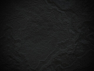 Abstract black sandstone background. Rock surface texture