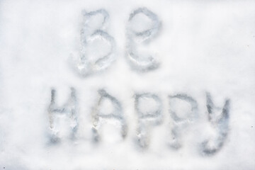Be Happy Message Written in Fresh Snow