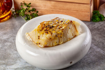 Steamed cod fish fillet with spices