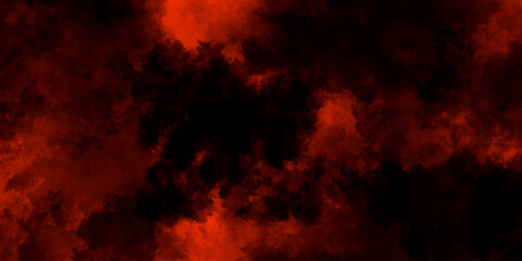 Fototapeta premium Abstract grunge red and black powder explosion cloud on black background. dark red smoke Like cloud wave effect on black. dark fire flame grunge texture background. toned fiery red sky.