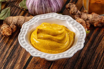 Indian yellow spicy curry sauce