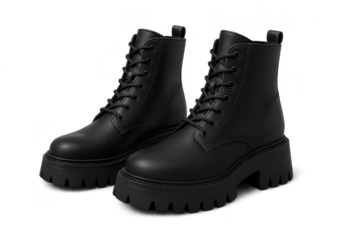 Pair of black leather ankle boots isolated on a transparent background image