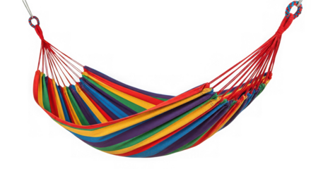 Vibrant rainbow striped hammock suspended against a dark background